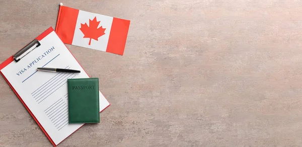 stock image Banner with visa application form, passport and Canadian flag on table. Concept of immigration