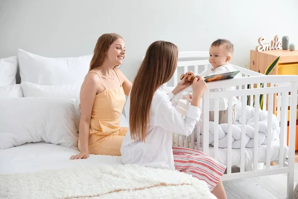 Happy Lesbian Couple Little Baby Book Toy Bedroom — Stock Photo, Image