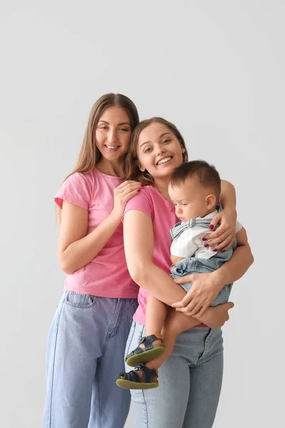 Happy Lesbian Couple Little Baby Grey Background — Stock Photo, Image