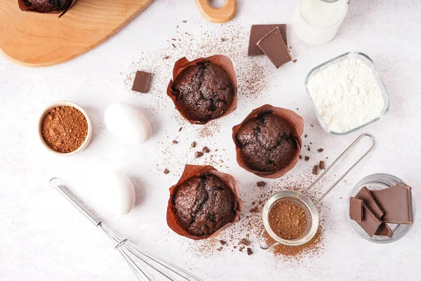 Composition Tasty Chocolate Muffins Ingredients Light Background — Stock Photo, Image