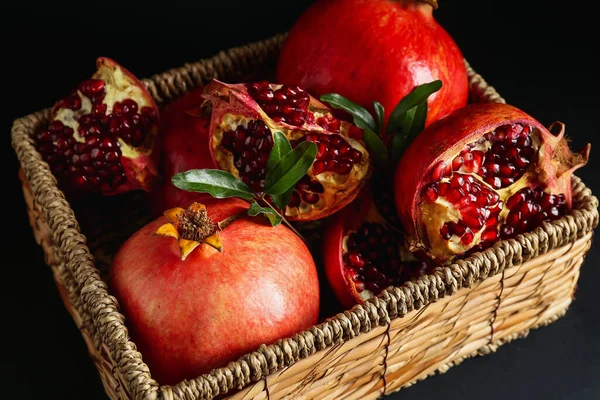 Wicker Basket Fresh Pomegranates Dark Background Closeup — Stock Photo, Image