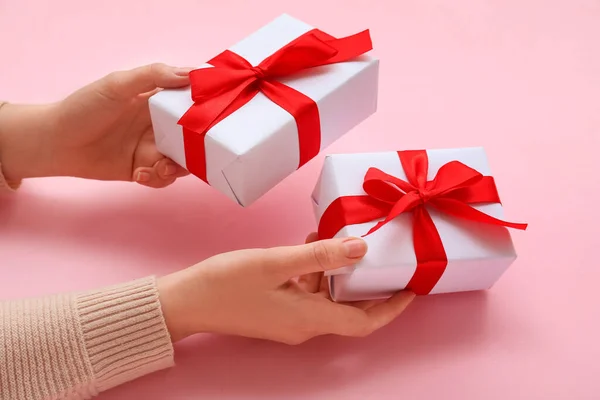 Female Hands Christmas Gifts Pink Background Closeup — Stock Photo, Image