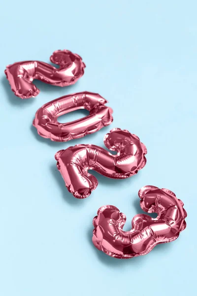 stock image Figure 2023 made of foil balloons on blue background