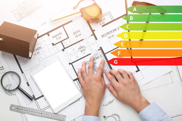 Stock image Male architect working on project of building in office, top view. Concept of smart home