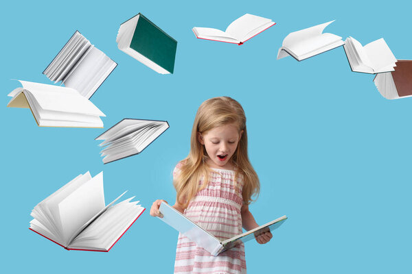 Surprised little girl and many flying books on light blue background
