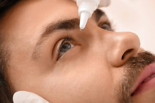 Ophthalmologist Putting Drops Young Man Eye Hospital Closeup — Stock Photo, Image