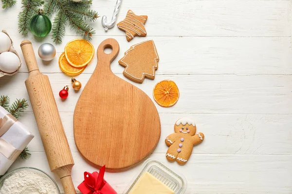 Composition Wooden Cutting Board Christmas Cookies Ingredients Decorations White Background — Stock Photo, Image