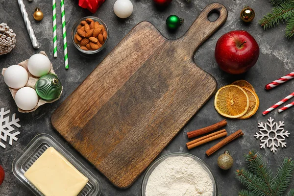 Composition Wooden Cutting Board Ingredients Christmas Baking Decorations Dark Background — Stock Photo, Image
