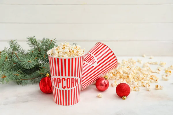 Buckets Popcorn Christmas Balls Fir Branches White Wooden Background — Stock Photo, Image