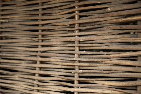 stock image Wicker wooden fence as background, closeup