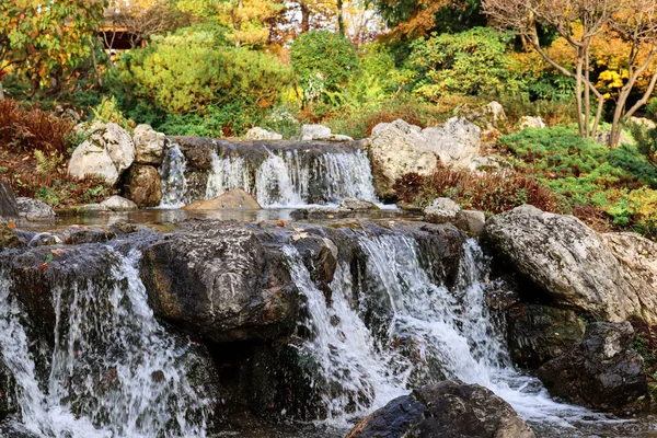 stock image View of autumn park with beautiful waterfall