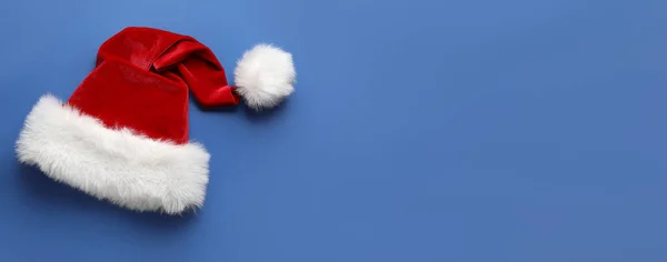 Santa Hatt Blå Bakgrund Med Utrymme För Text — Stockfoto