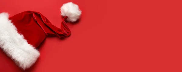 Santa Hatt Röd Bakgrund Med Utrymme För Text — Stockfoto