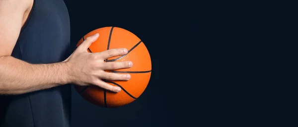 Male Basketball Player Holding Ball Dark Background Space Text Closeup — Stock Photo, Image