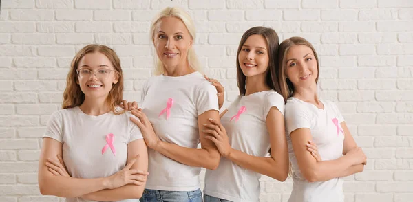 Beautiful Women Pink Ribbons White Brick Background Breast Cancer Awareness — Stock Photo, Image