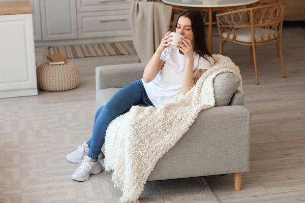 Young Woman Drinking Tea Grey Sofa Kitchen — Stock Photo, Image