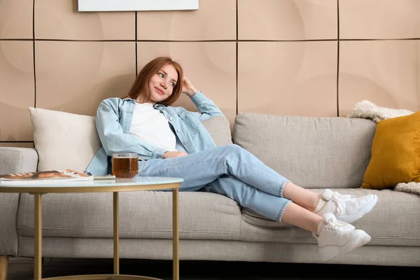 Beautiful Woman Resting Grey Sofa Home — Stock Photo, Image