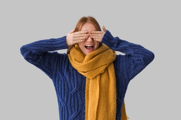 Young Redhead Woman Warm Scarf Closing Eyes Grey Background — Stock Photo, Image
