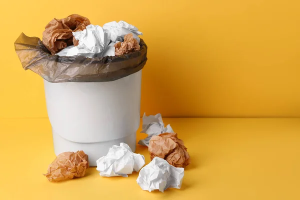 Rubbish Bin Crumpled Paper Yellow Background — Stock Photo, Image