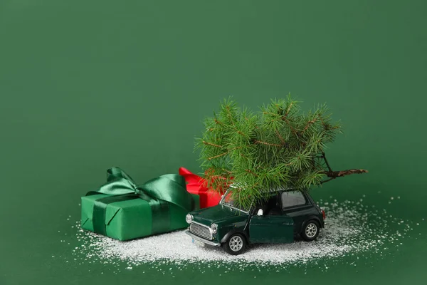 Toy Car Christmas Branches Gifts Snow Green Background — Stock Photo, Image