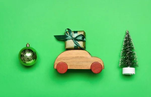 Toy Car Gift Christmas Tree Ball Green Background — Stock Photo, Image