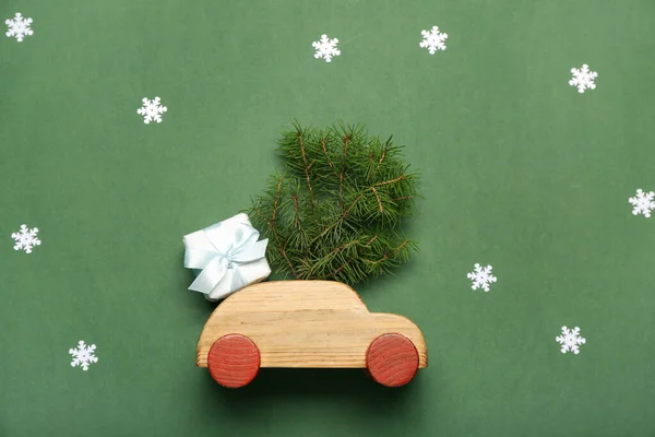 Toy Car Christmas Branches Gift Snowflakes Green Background — Stock Photo, Image