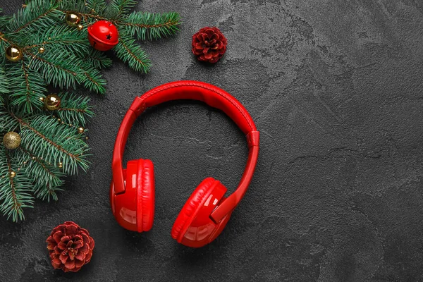 Composition Modern Headphones Fir Branches Christmas Decorations Dark Background — Stock Photo, Image