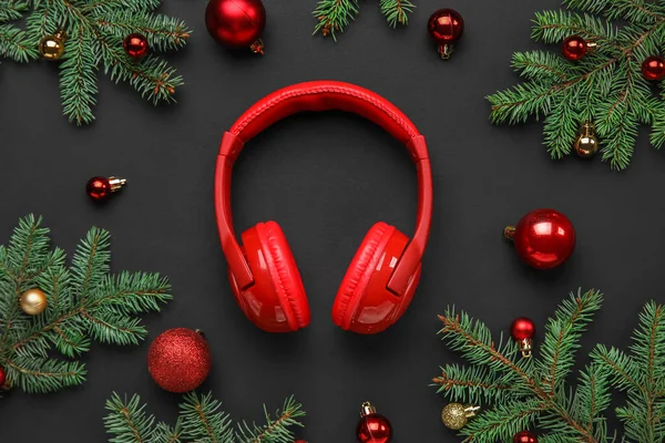 Composition Modern Headphones Christmas Balls Fir Branches Dark Background — Stock Photo, Image