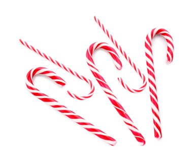 Beyaz arka planda lezzetli baston şekerli kompozisyon