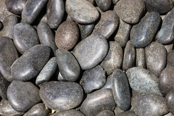 Black Pebbles Background Closeup — Stock Photo, Image