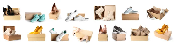 一套纸板箱 上面有一双时髦的鞋子 与白色隔离 — 图库照片