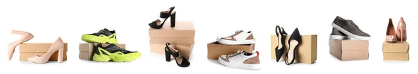 一套纸板箱 上面有一双时髦的鞋子 与白色隔离 — 图库照片