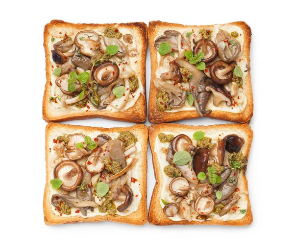 stock image Delicious toasts with cream cheese, mushrooms and pesto sauce on white background