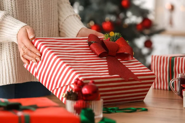 Woman Striped Christmas Gift Box Table Closeup — Stock Photo, Image
