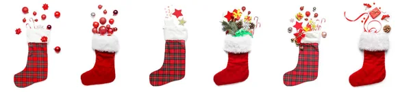 Beyaz Arka Planda Hediyeli Süslemeli Noel Çorapları Koleksiyonu — Stok fotoğraf