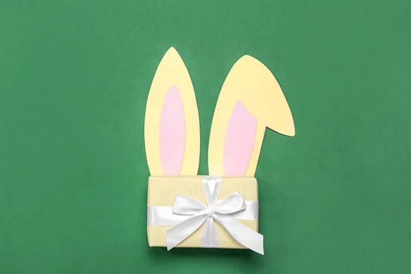 Paper Bunny Ears Christmas Gift Green Background — Stock Photo, Image