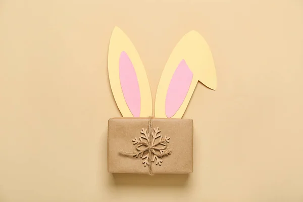 Paper Bunny Ears Christmas Gift Beige Background — Stock Photo, Image
