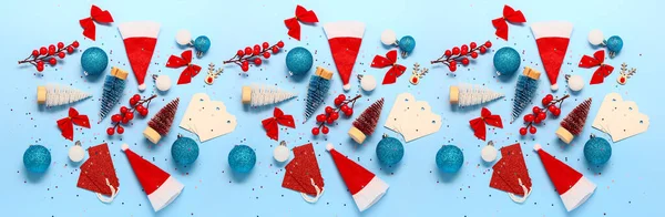 Composition Different Christmas Decorations Santa Hats Light Blue Background — Stock Photo, Image