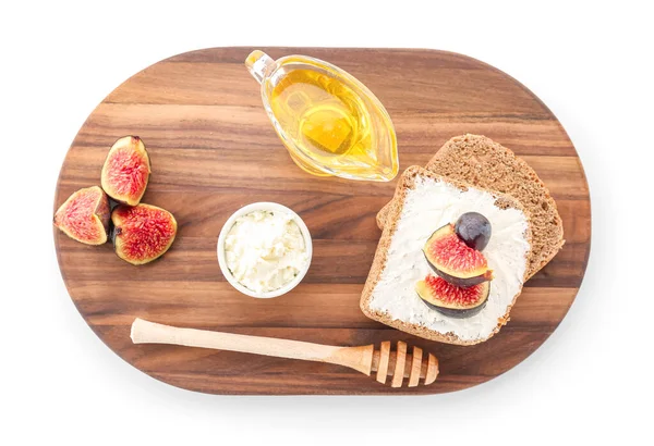 Wooden Board Tasty Bruschettas Cream Cheese Figs Honey White Background — Stock Photo, Image