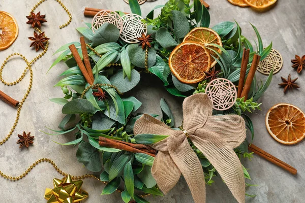 Stylish Christmas Wreath Decorations Orange Slices Cinnamon Grunge Background Closeup — Stock Photo, Image