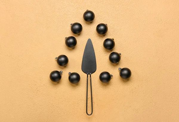 stock image Christmas tree made of cake spatula and balls on beige background