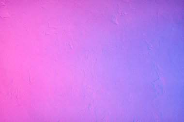 Arka plan olarak neon ışığı altında beton yüzey