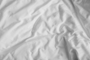 Beyaz yumuşak yatak örtüsünün yakın görüntüsü