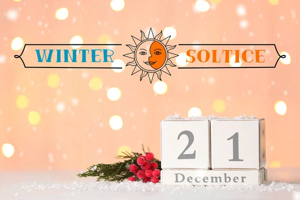 Calendar with date of winter solstice on light background