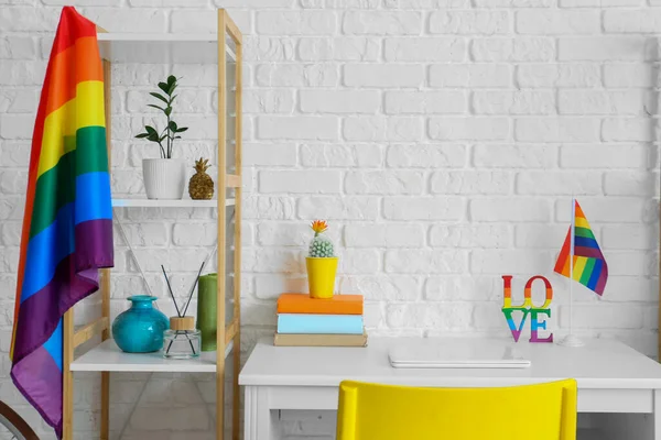 Stylish Workplace Modern Laptop Rainbow Flags White Brick Wall — Stock Photo, Image