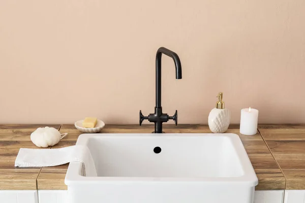 Sink Bath Accessories Burning Candle Table Beige Wall — Stock Photo, Image