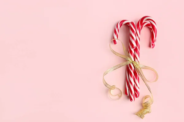 Sweet Candy Canes Tied Ribbon Pink Background — Stock Photo, Image
