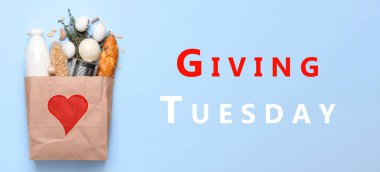 Mavi arka planda yiyecek olan kağıt torba. Salı Vermek