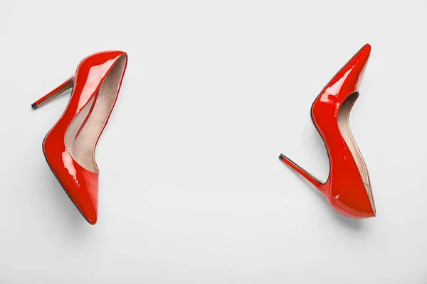 stock image Red female heels on white background