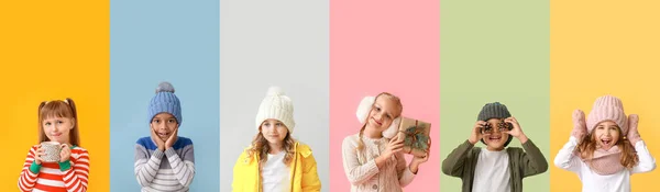 Kış Kıyafetleri Içinde Renkli Arka Planda Bir Grup Şirin Çocuk — Stok fotoğraf